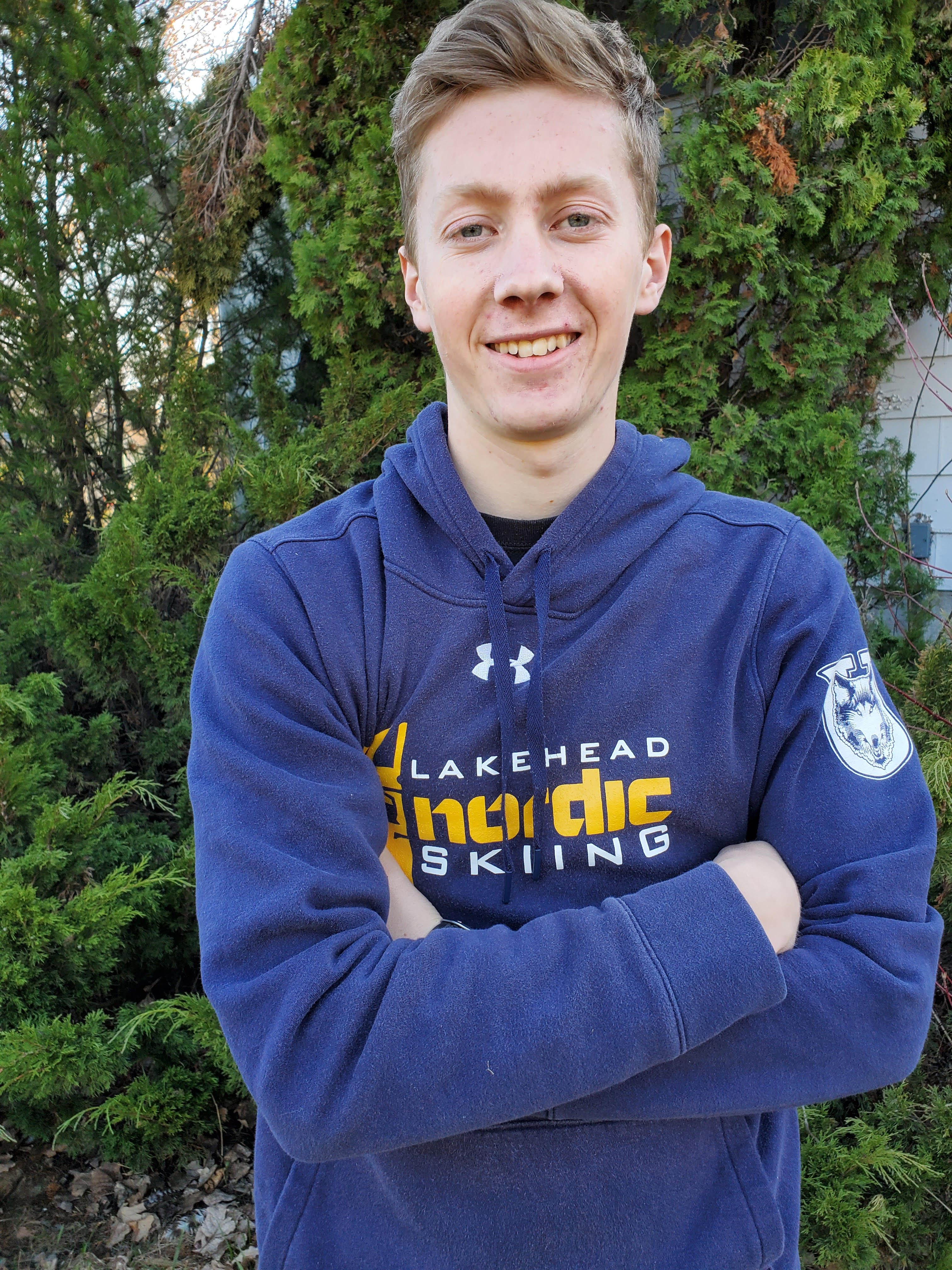 Image of Aaron Warkentine wearing a blue Lakehead Nordic Ski sweater